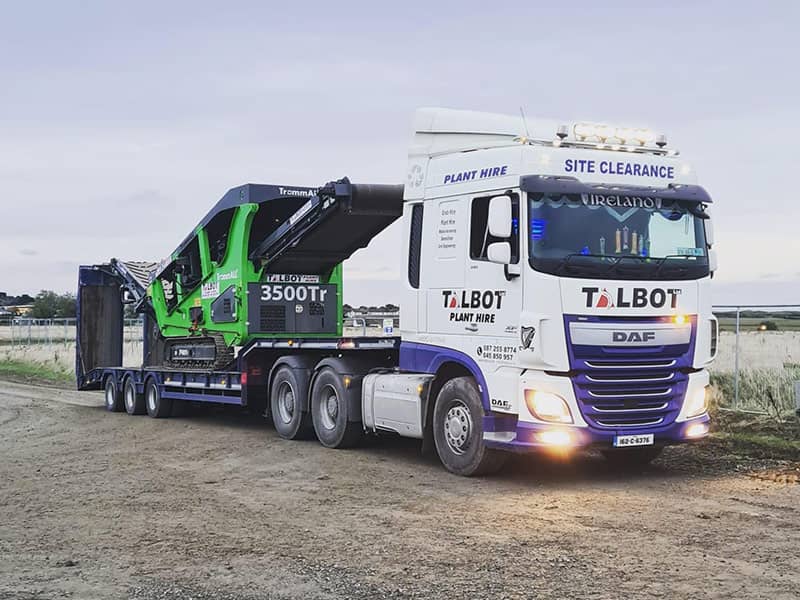 Picture of Talbot Grab Hire truck with a mini digger - both available for hire Arctic truck for hire at Talbot Plant Hire (image)