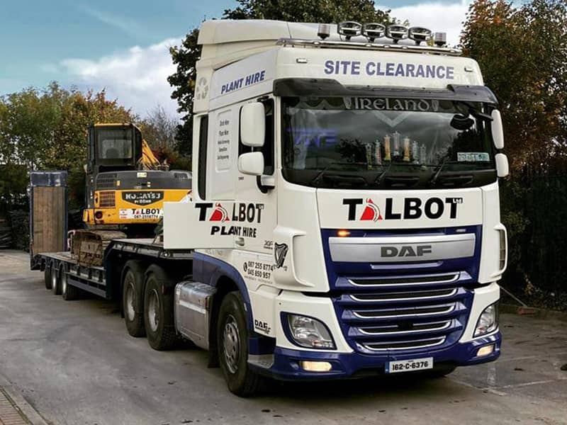 Picture of Talbot Grab Hire truck with a mini digger - both available for hire Low loader transportation from Talbot Plant Hire (image)