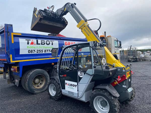 Picture of Talbot Grab Hire truck with a mini digger - both available for hire Talbot grab hire truck with mini telehandler (image)